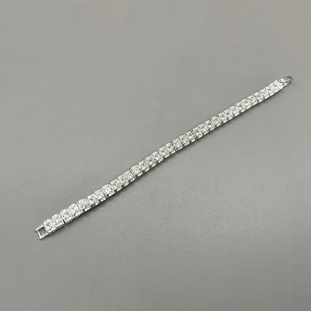 Avon Tennis Bracelet Women Silver Tone Clear Rhinestone Crystal Fold Over Clasp